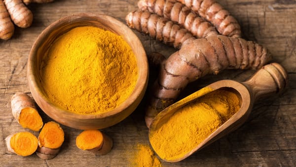 Turmeric spice and turmeric tubers displayed