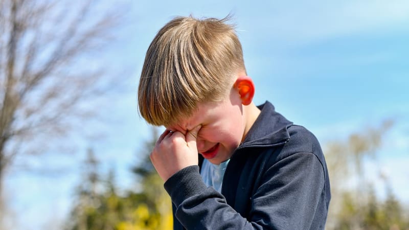 A crying child experiencing sudden distress