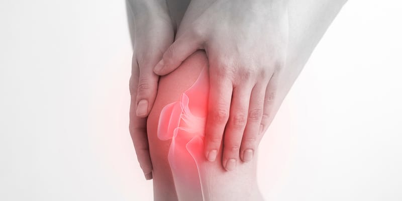 A person experiencing knee pain